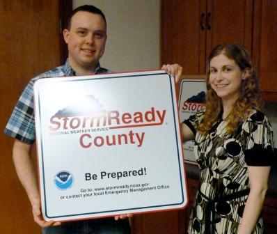 Will and Renate with Storm Ready Road Sign